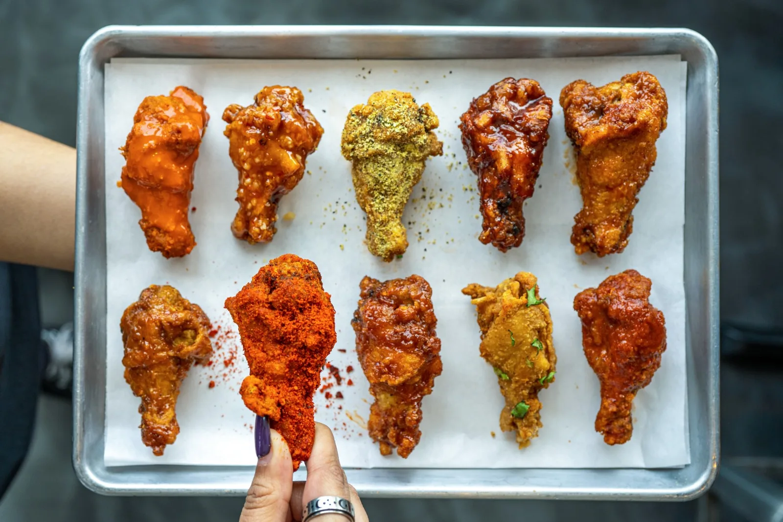 Crispy sauced wings on a tray